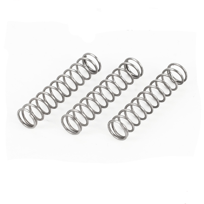 Ressort de compression à compression adaptative