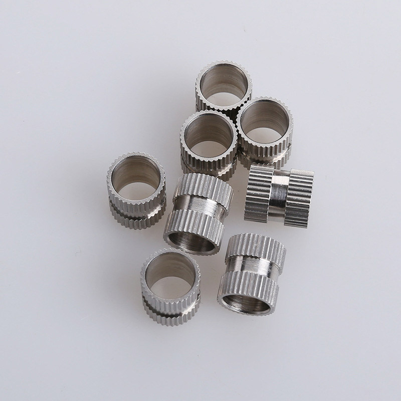 Écrou d'insertion à double voie