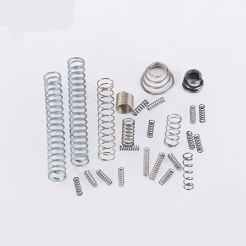 Ressort de compression à action douce